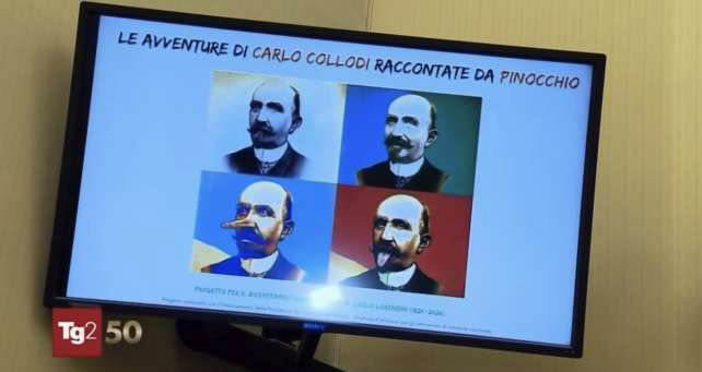 Schermo con la locandina del progetto durante il servizio del Tg2